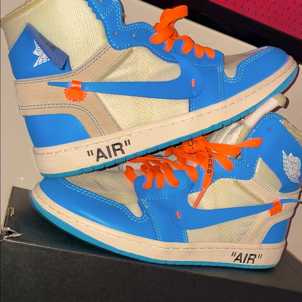 These or the off-white Jordan one baby blue